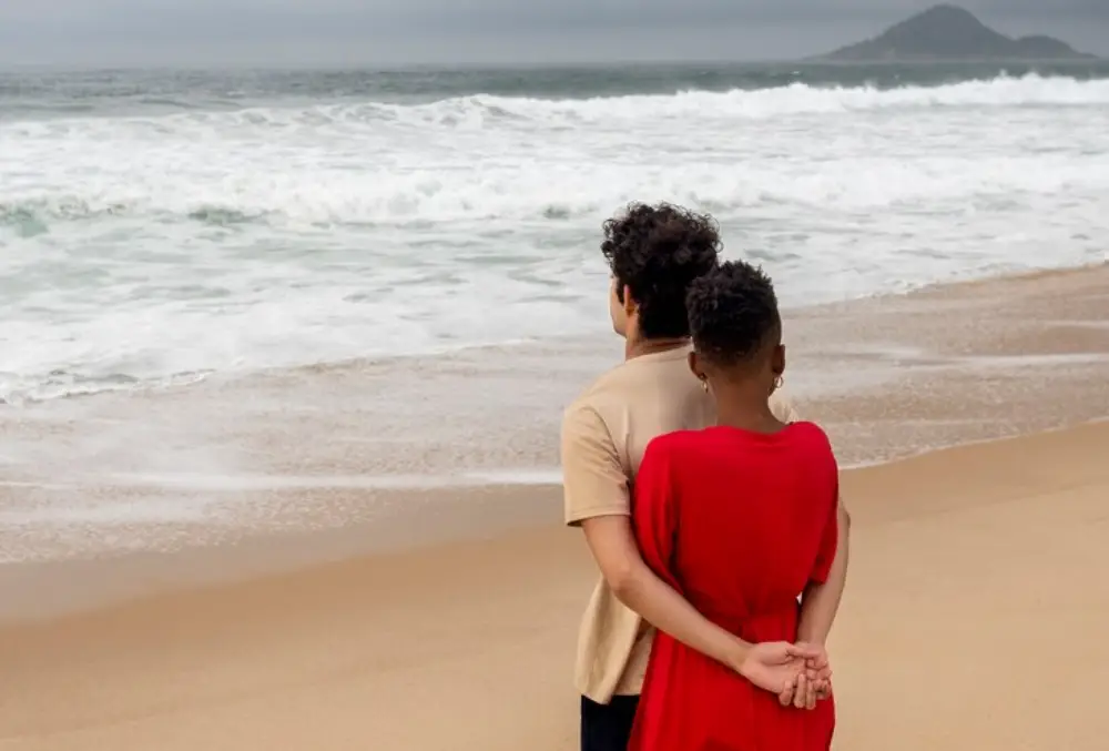 couple-showing-love-on-the-beach-near-the-sea